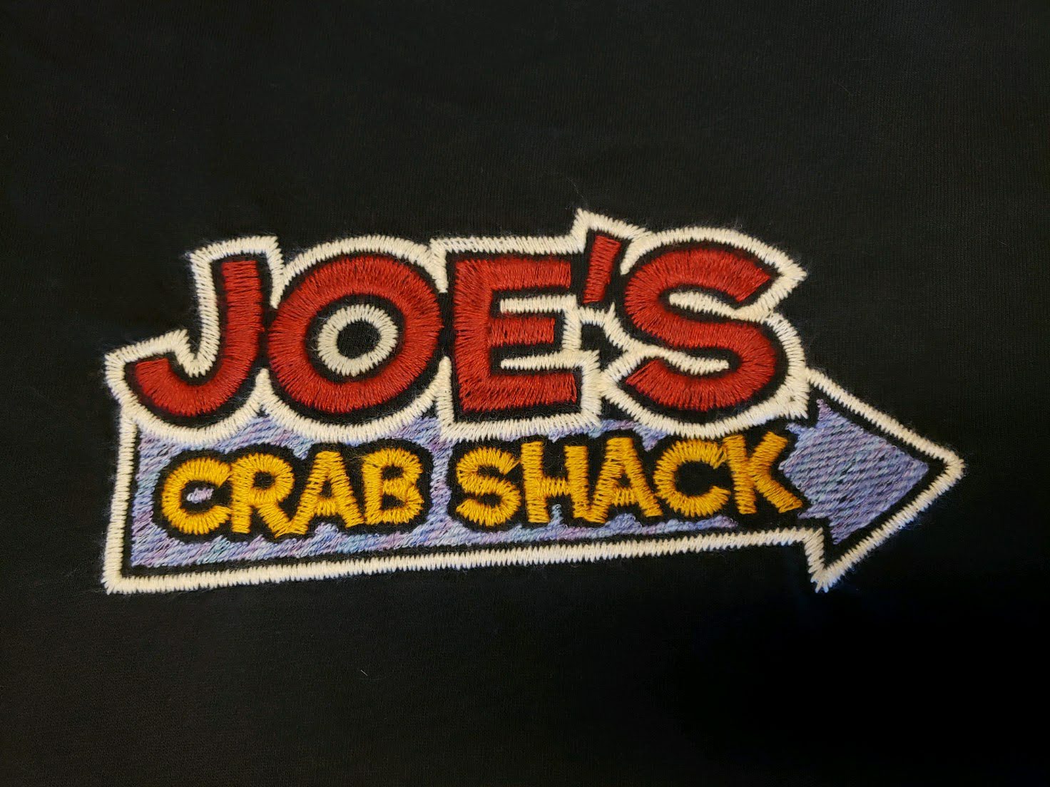 Joe's Crab Shack emboirdered using thick thread