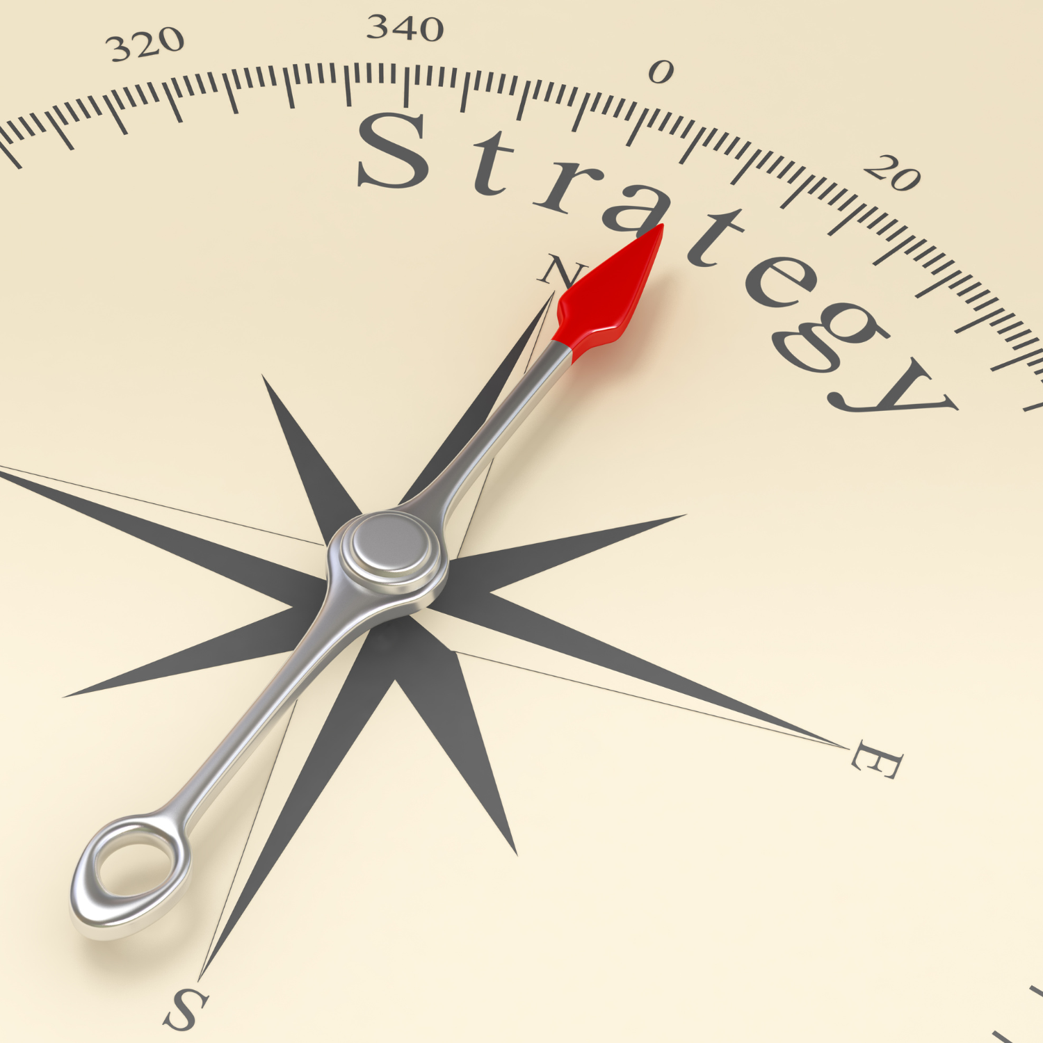 A compass with a red arrow that's pointing "north" to the word "strategy"