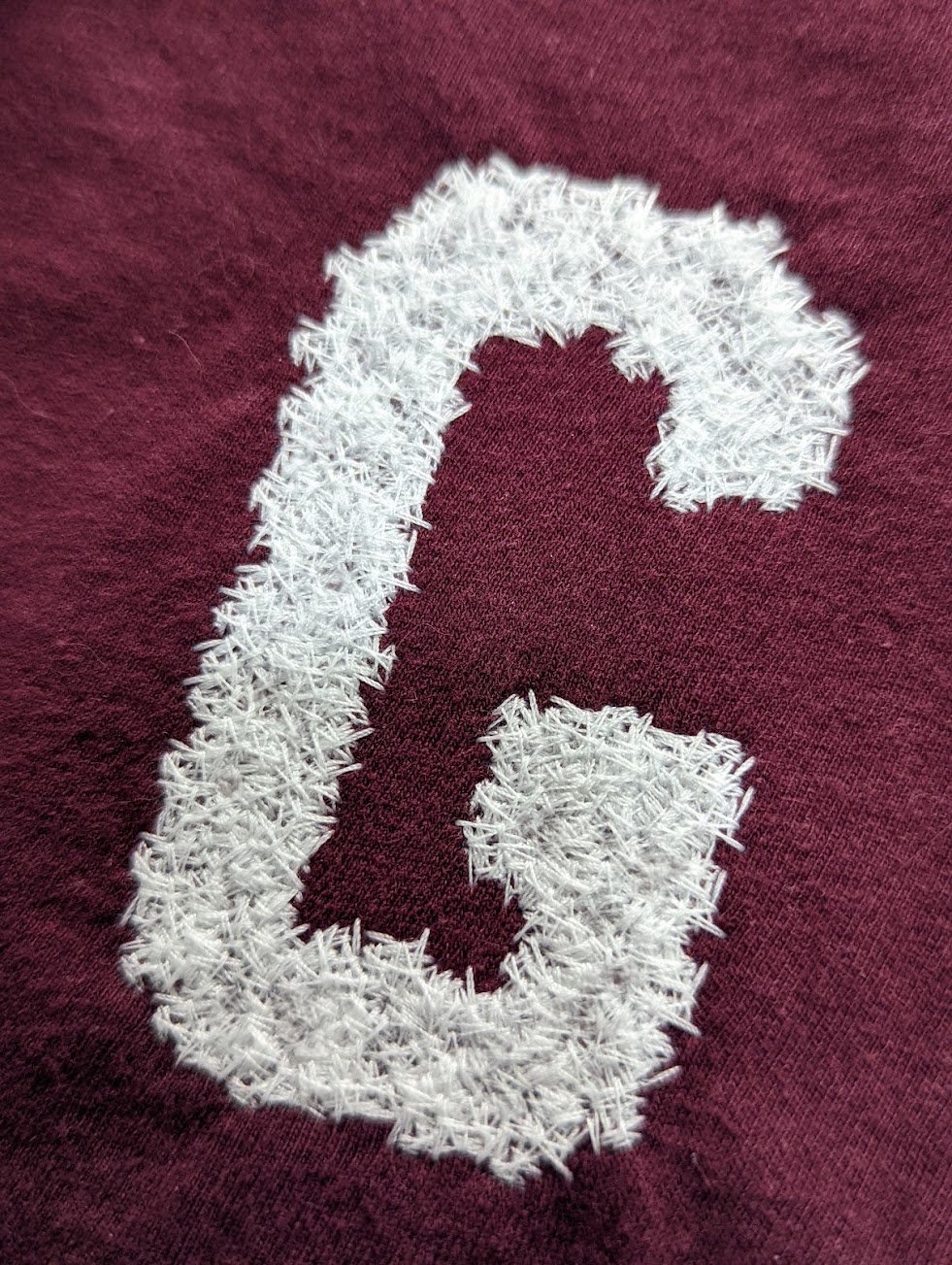 Example of a distressed faux chenille stitch