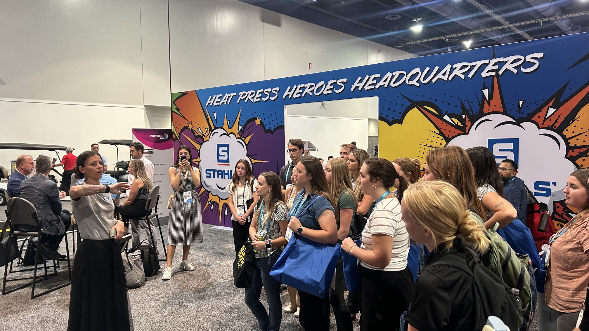 Students gather at PRINTING United Expo to learn about apparel decorating technologies