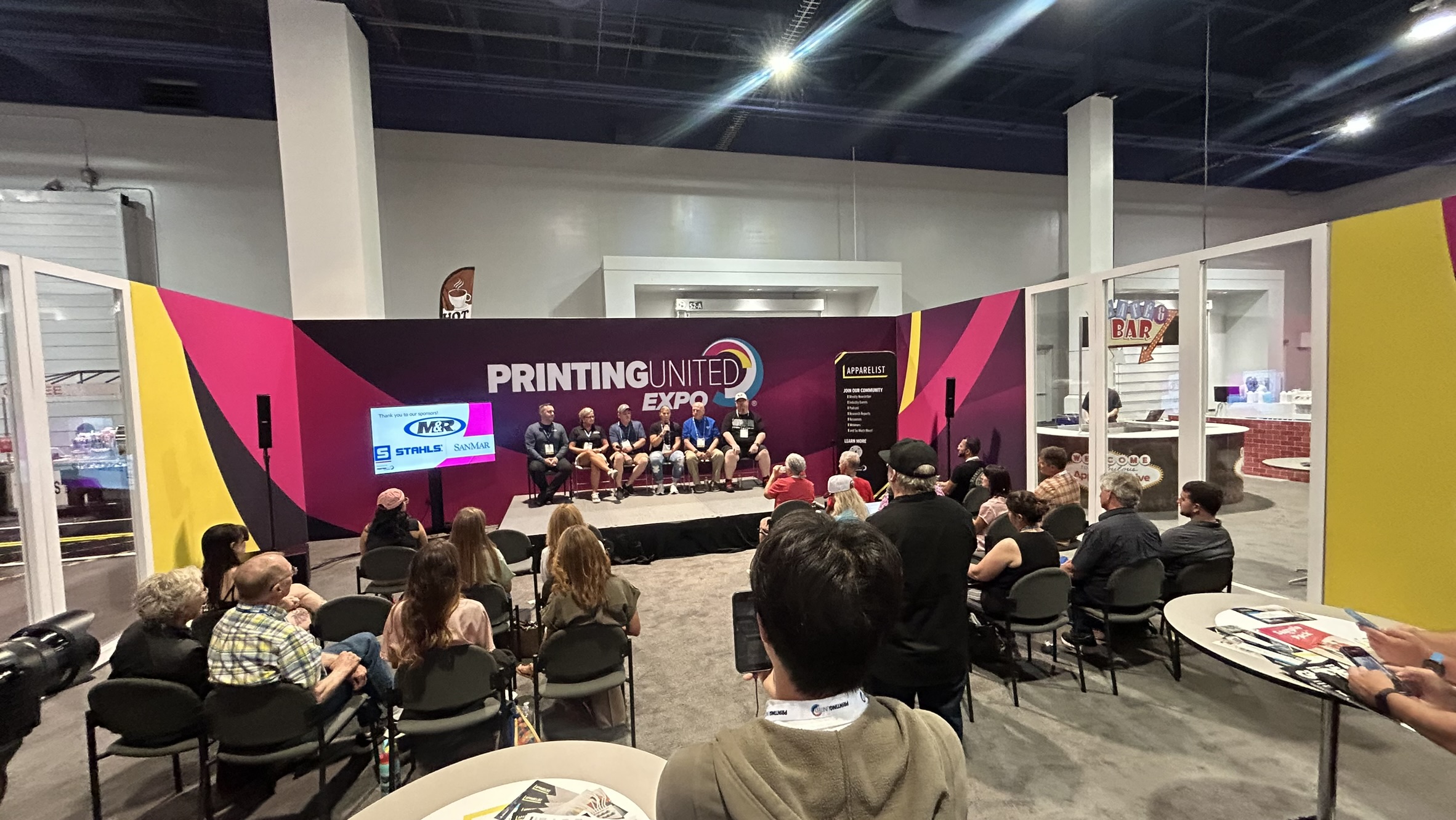 Panelists sitting at PRINTNG United Expo