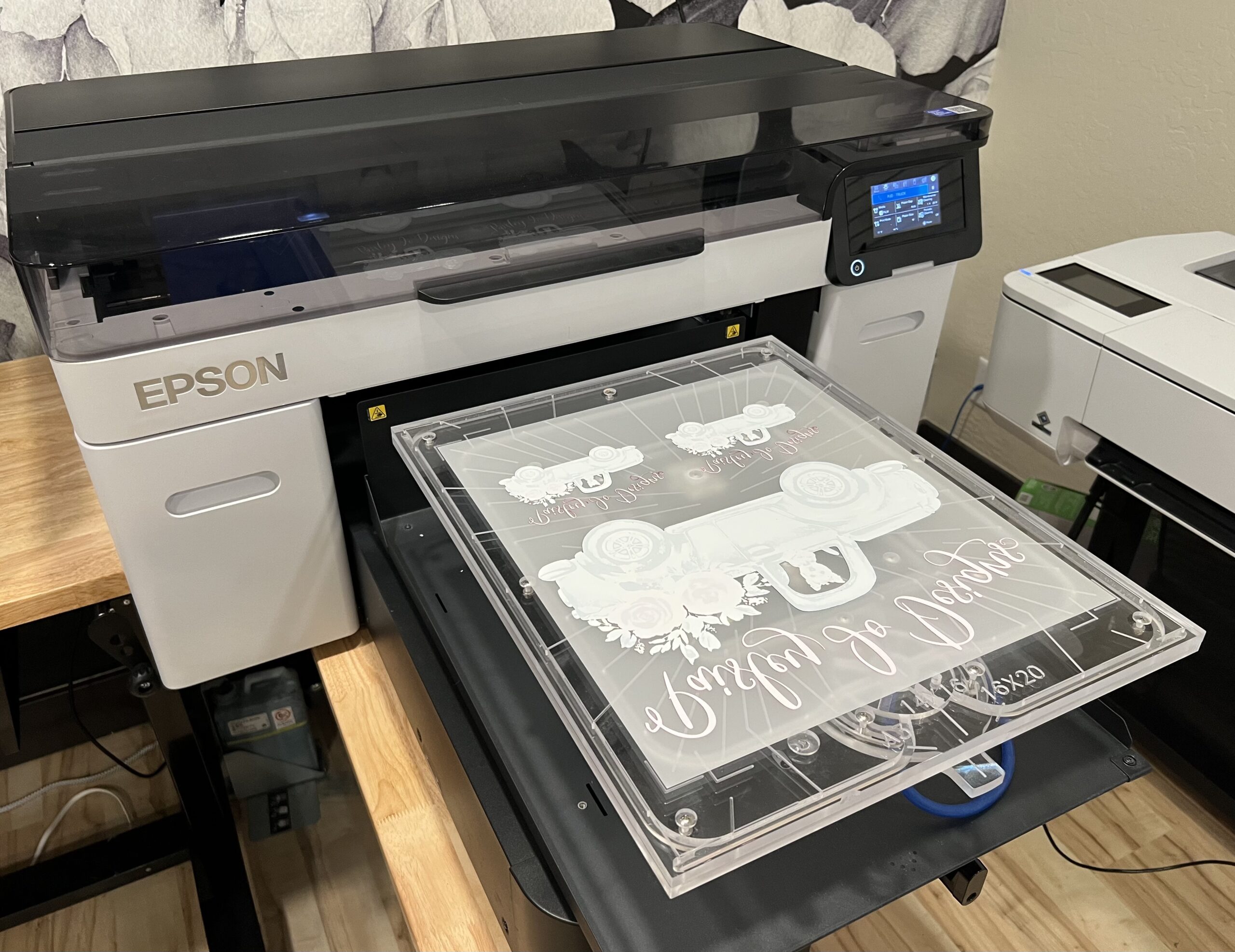 A transfer film on a platen feeding into a printer