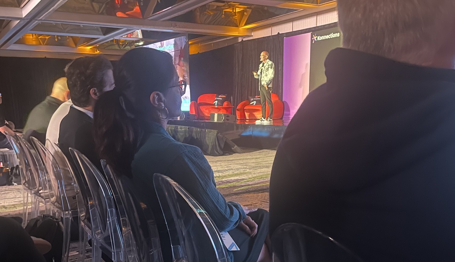 Ronen Samuel standing on stage wearing a custom jacket