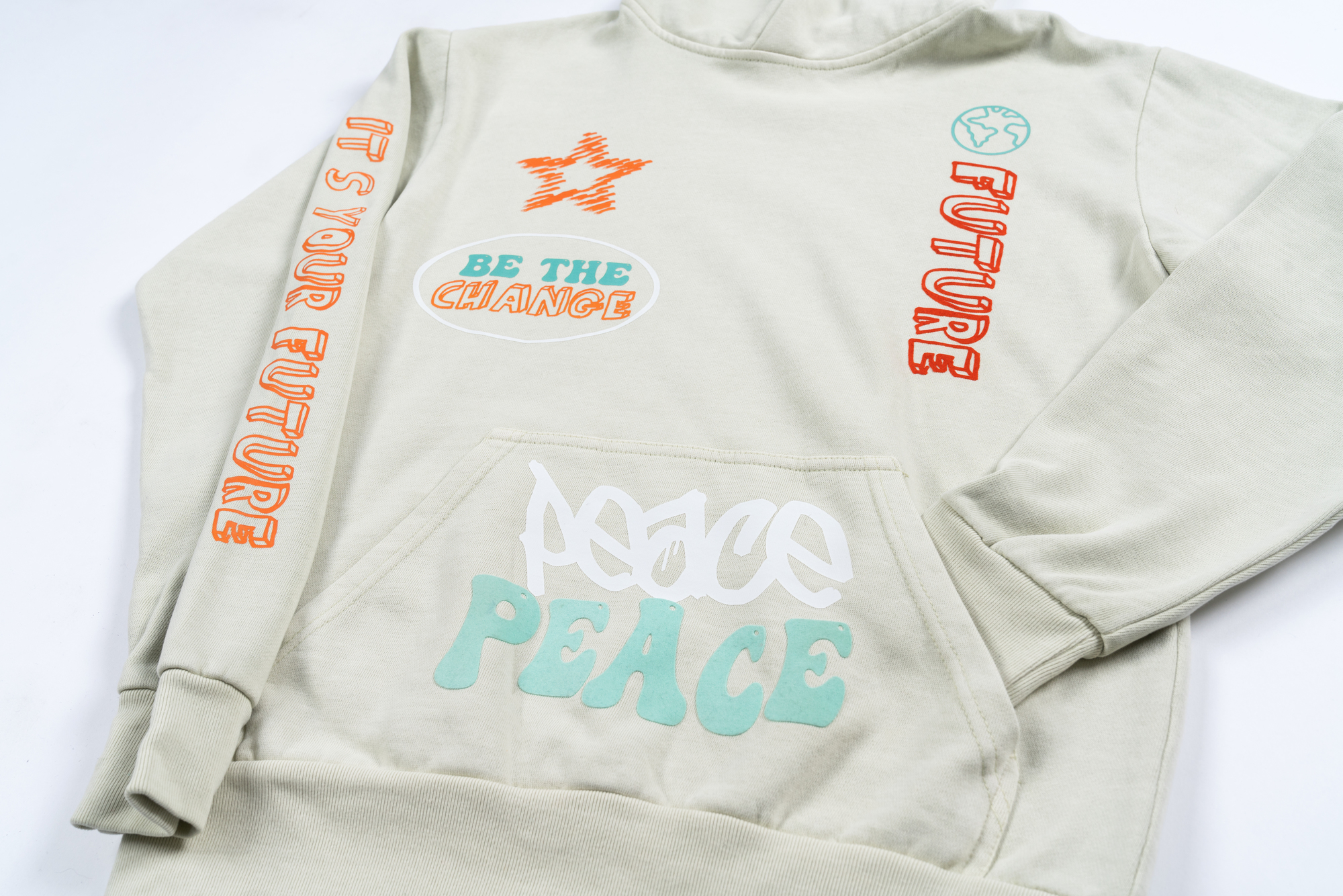 White hoodie with transfers printed on sleeves and pocket