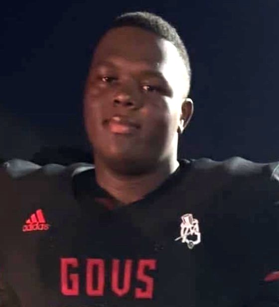 Aaron Anderson wearing a football jersey