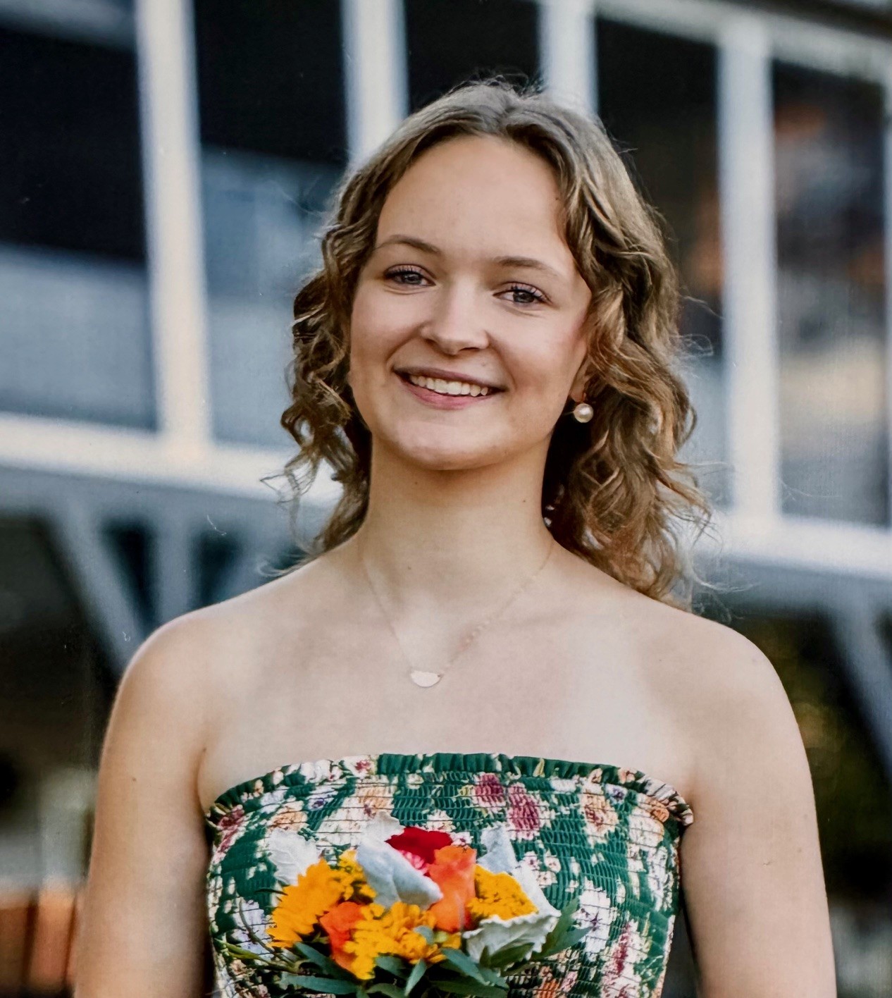 Anna Parks Leonard wearing floral dress