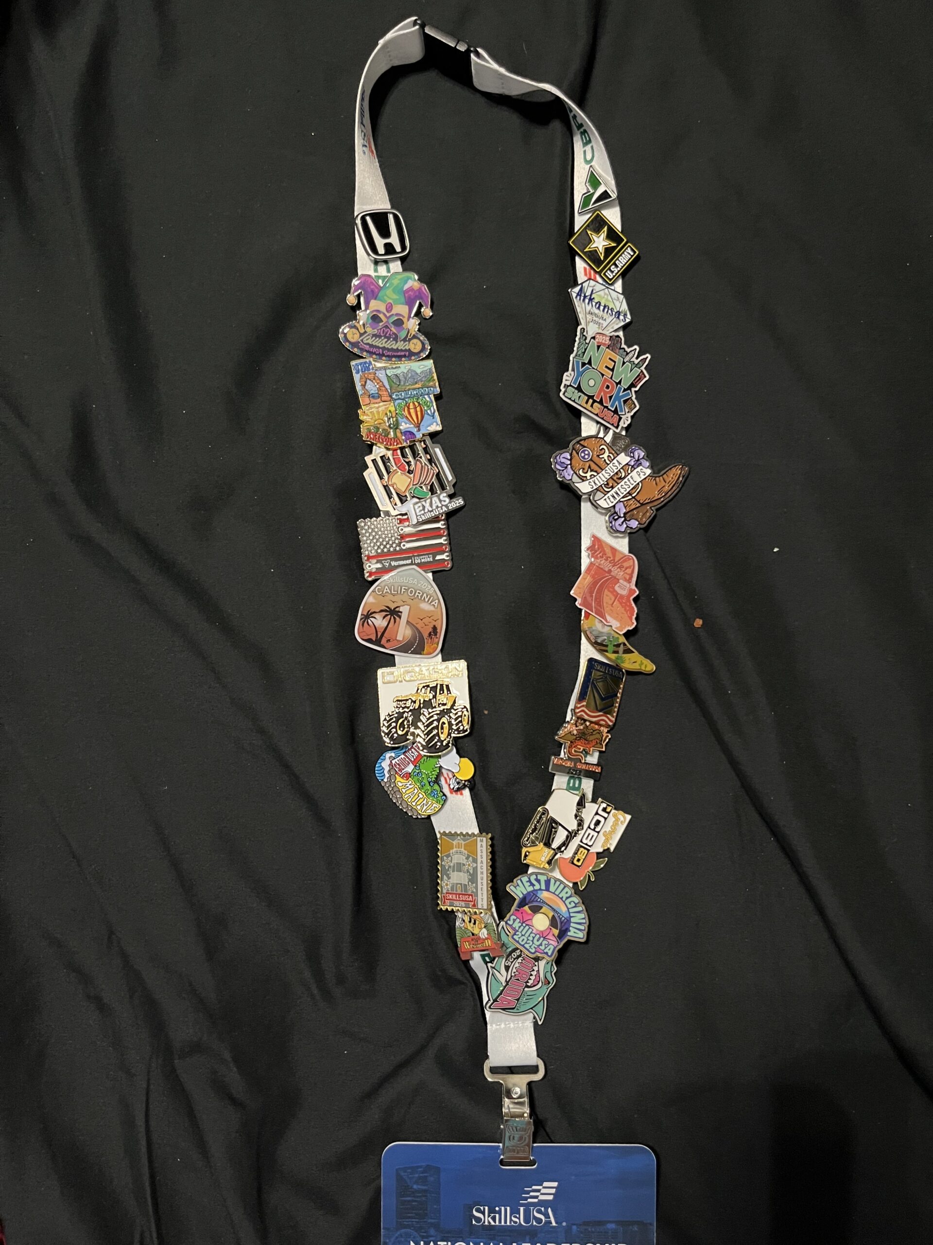 Pins collected during SkillsUSA and pinned to a lanyard