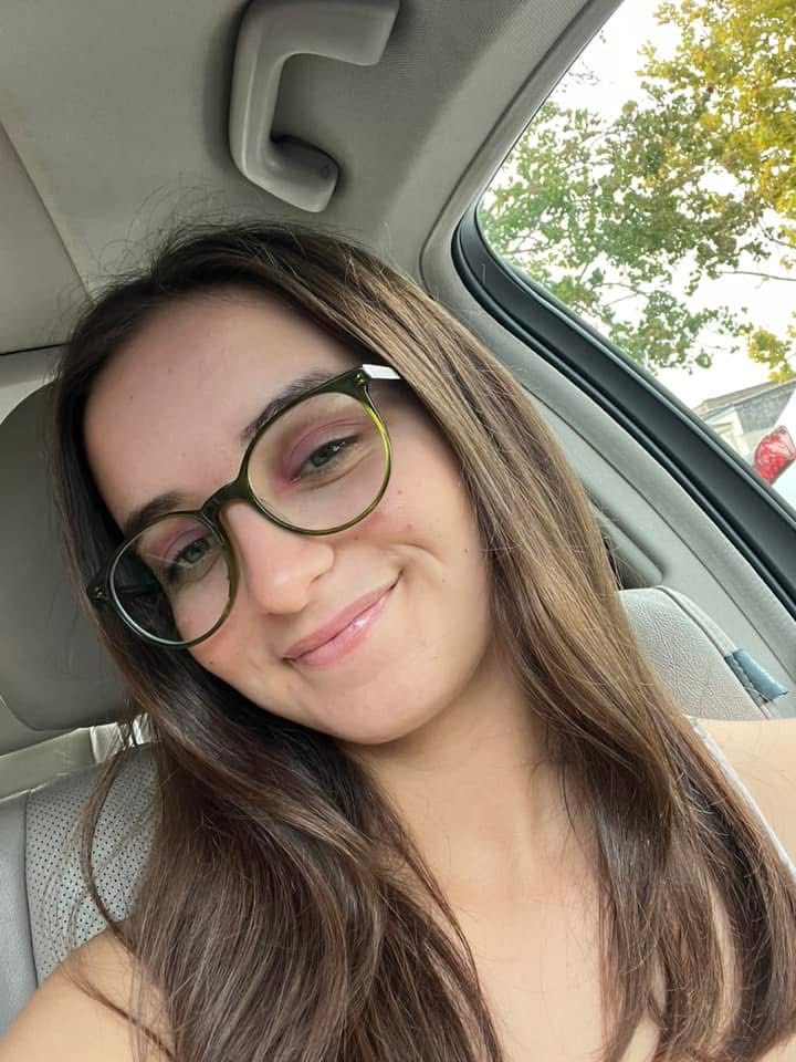 Leah Sanchez with brown hair and glasses