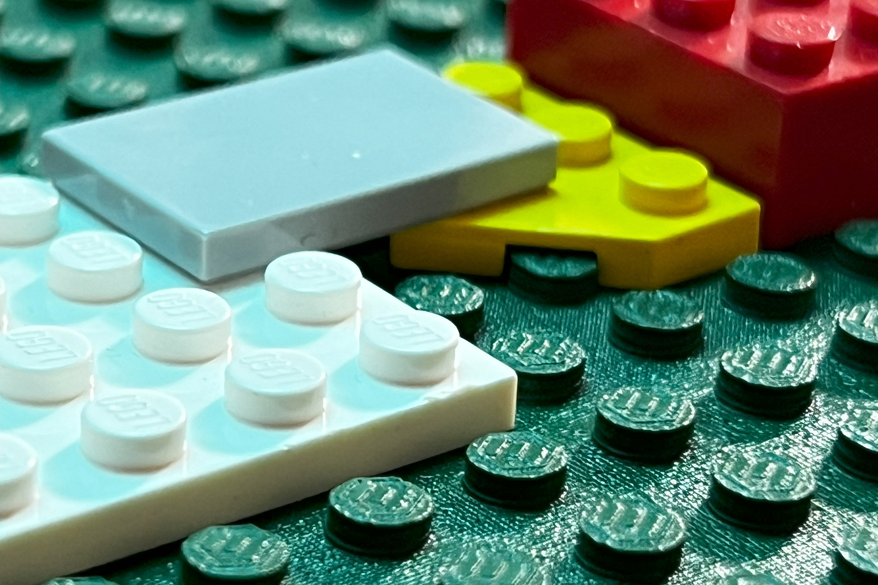 Close-up of a LEGO&reg; baseboard printed on the V-2000HD press using a specialty high-density ink that hardens like plastic.