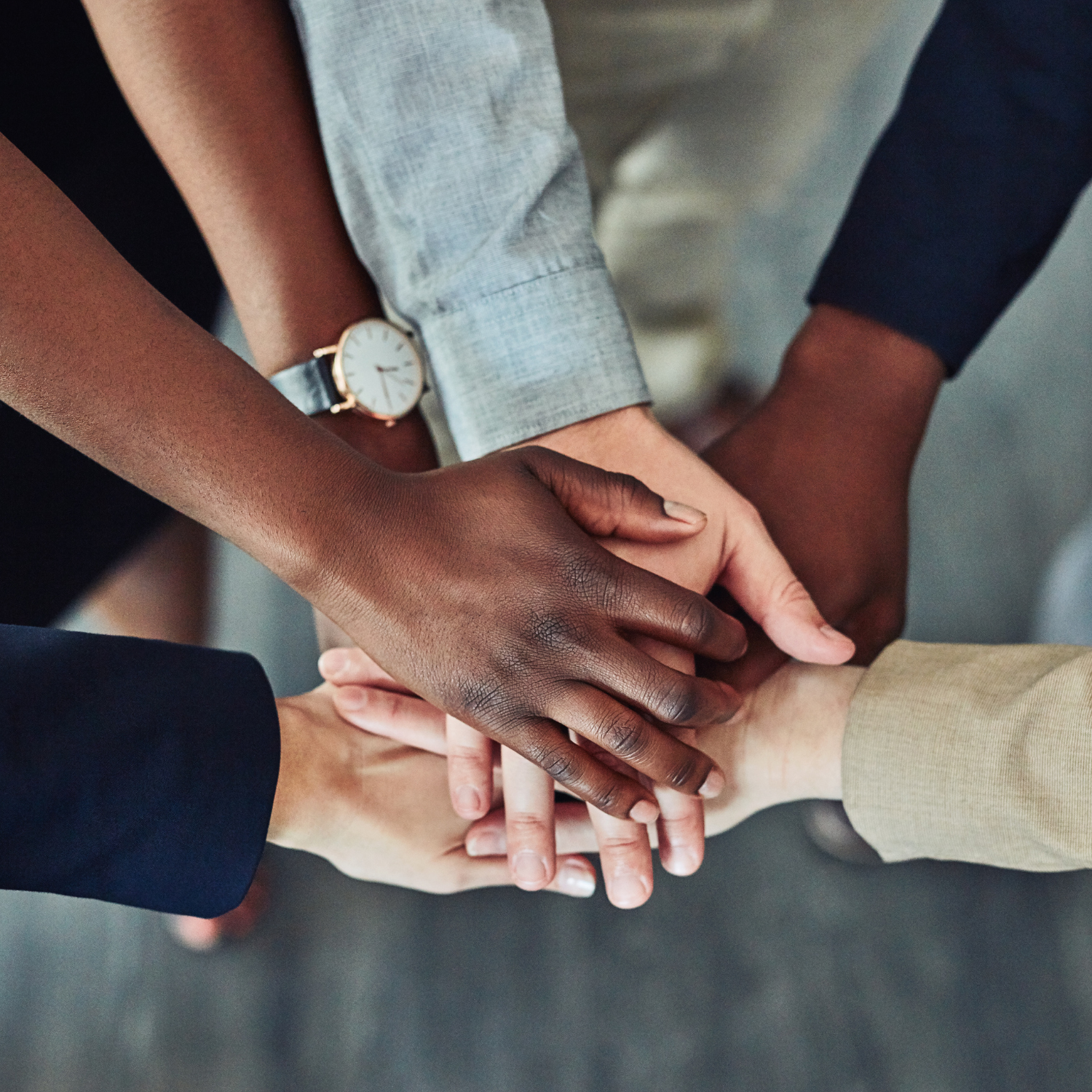 A bunch of hands doing a duddle cheer