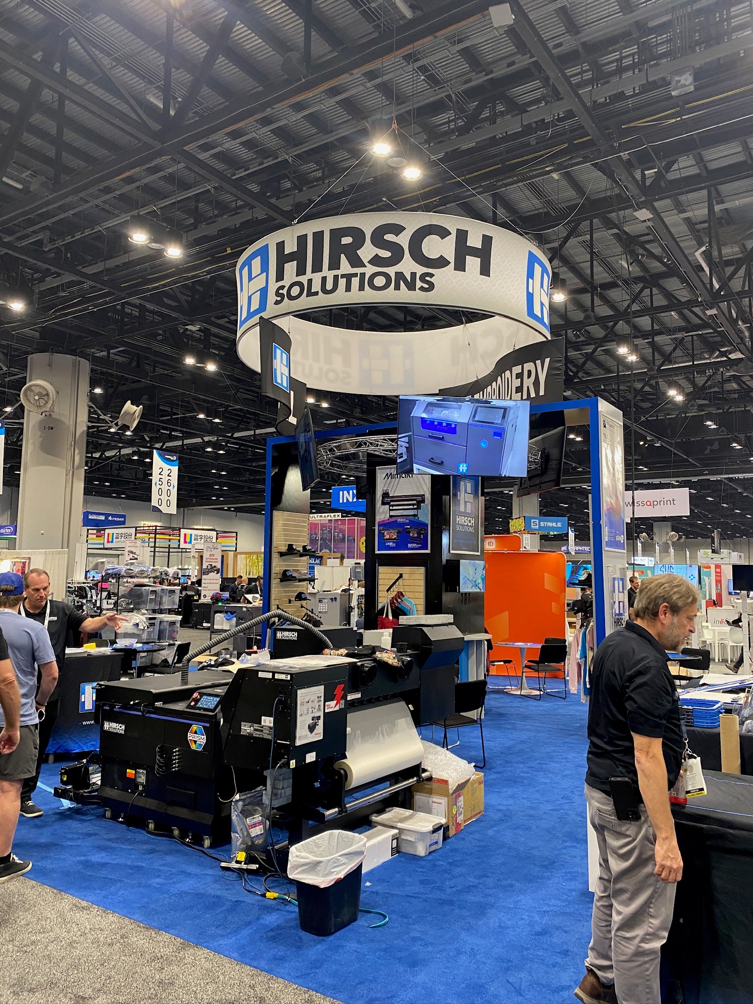 A wide-angle image of the Hirsch Solutions booth
