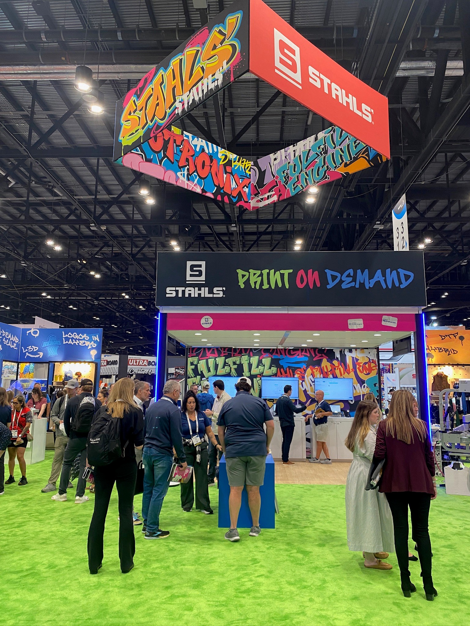 A wide angle image of the STAHLS' booth at PRINTING United Expo 2025
