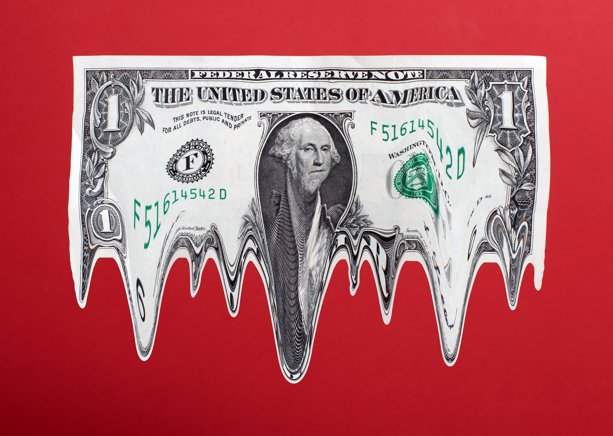A mleting dollar bill with red background