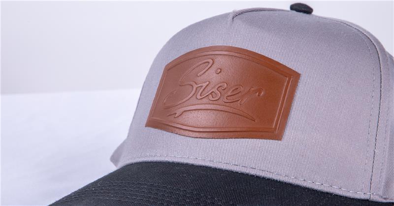 faux leather patch on gray hat