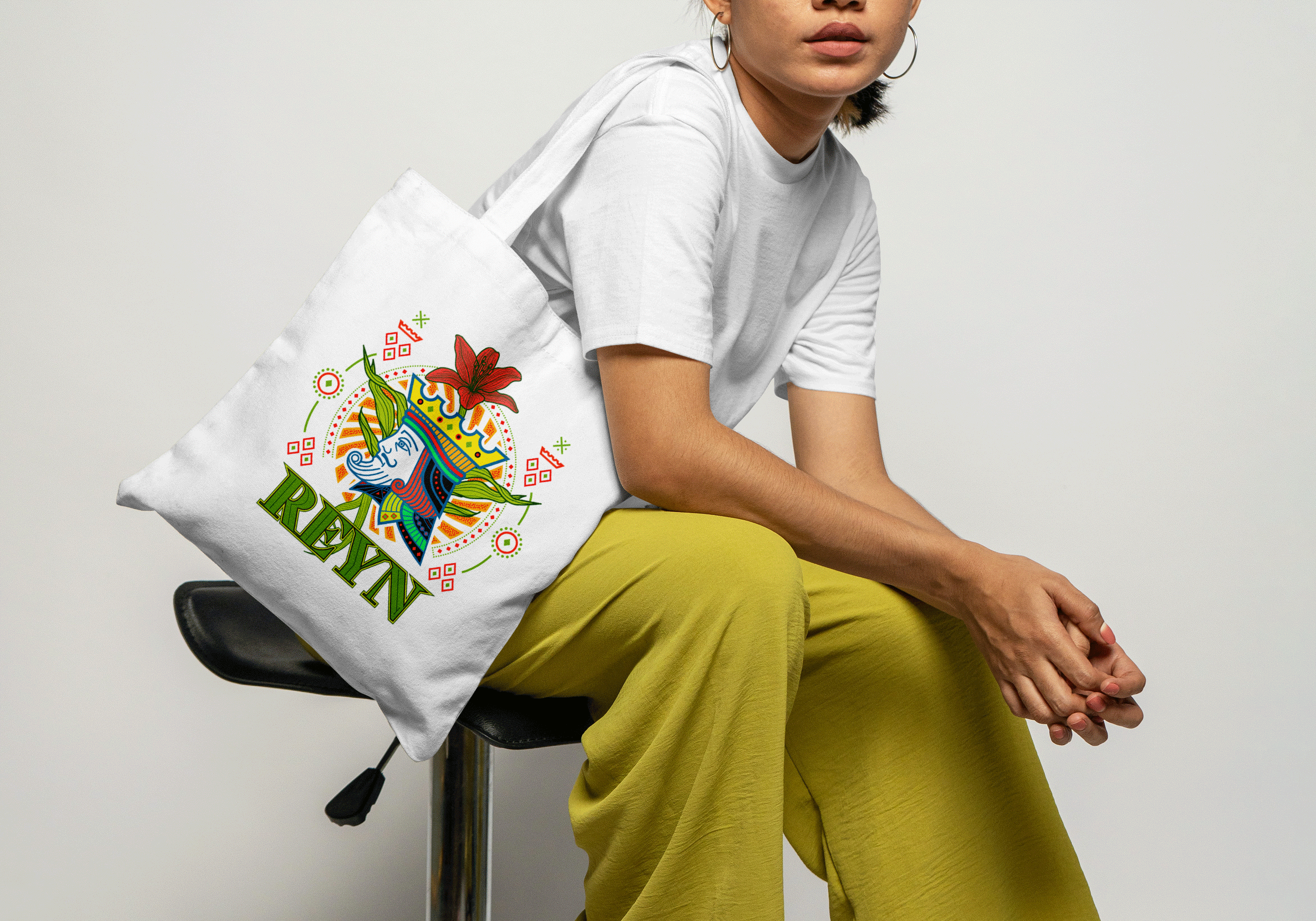 woman holding tote bag with a DTF print