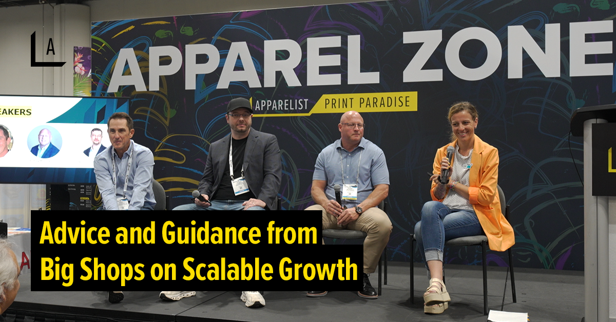 four panelists seated on stage