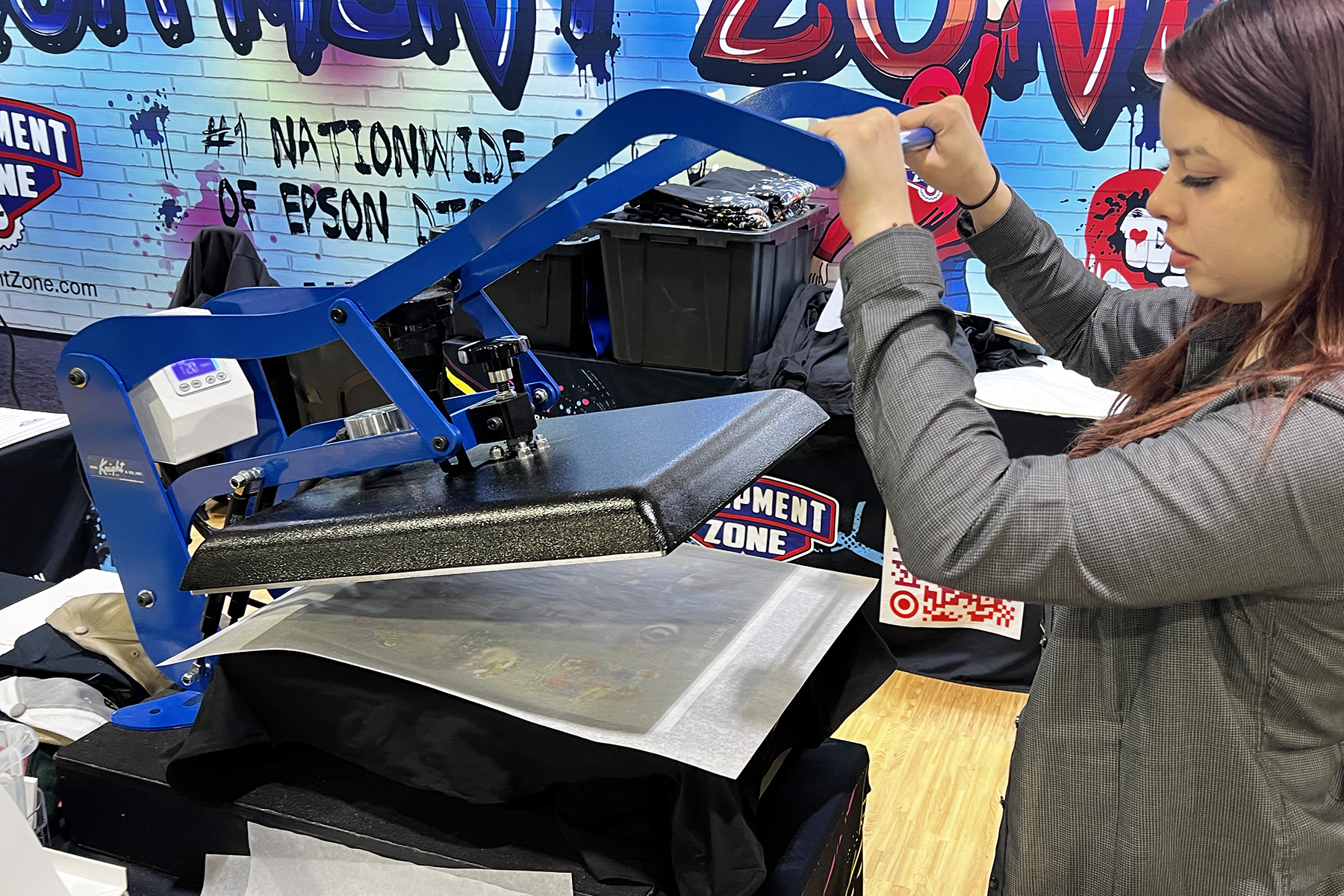 woman closing a heat press
