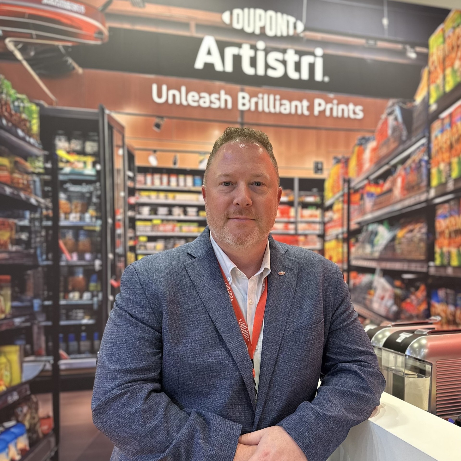 man wearing blue suit jacket