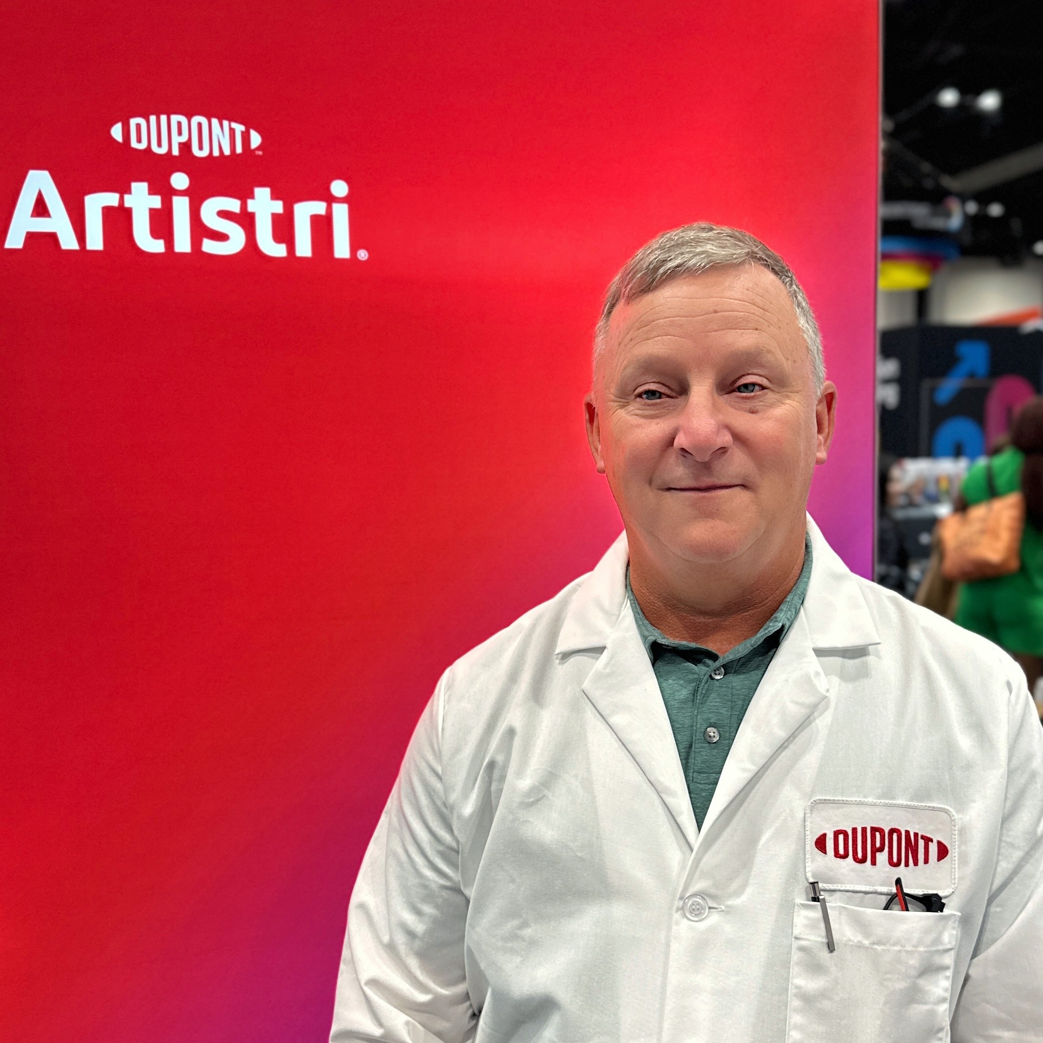 man wearing white lab coat