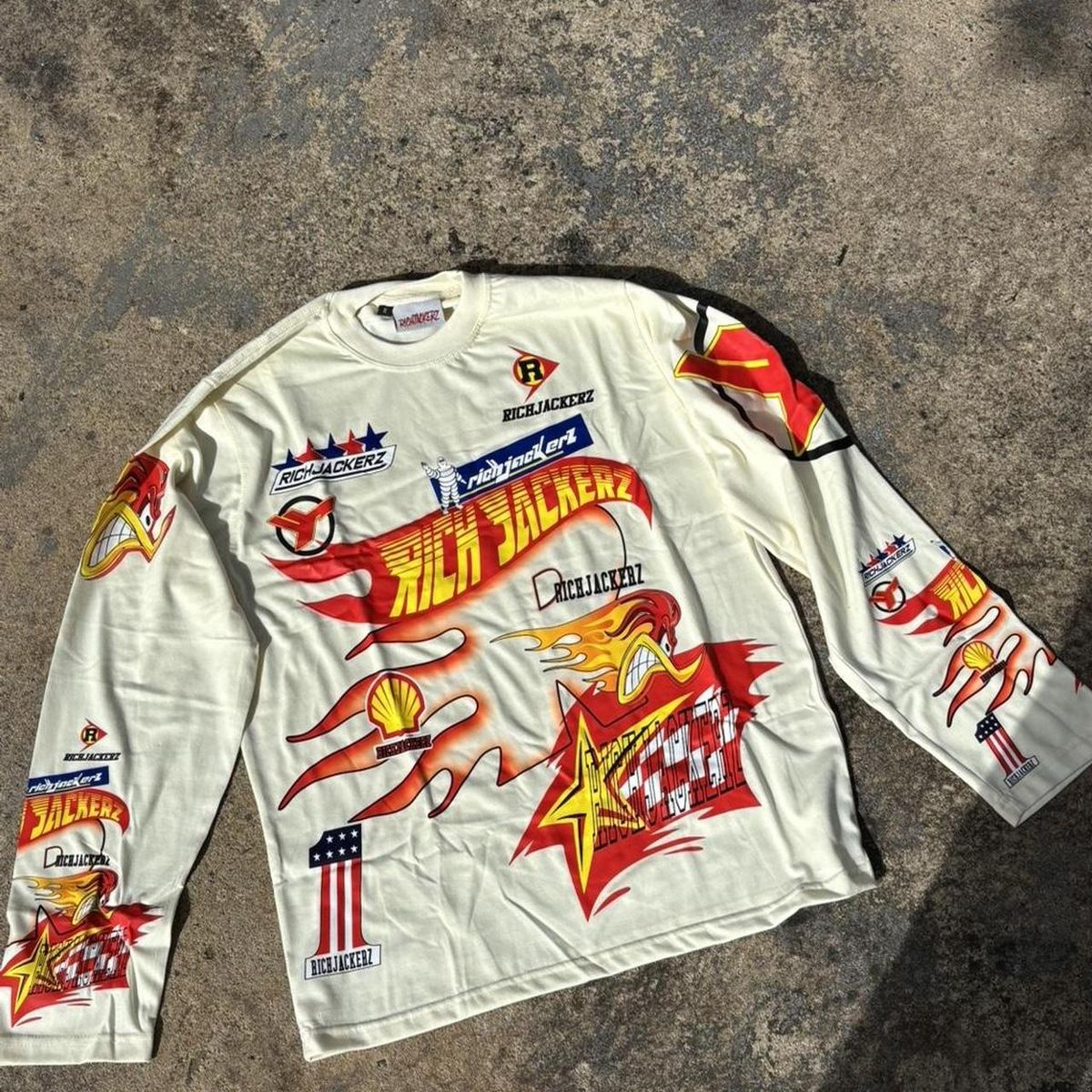 T-shirt with red and yellow logos