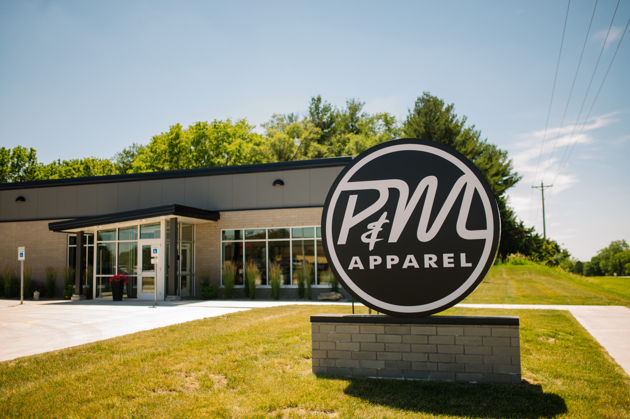 outside image of building with P&M Apparel sign