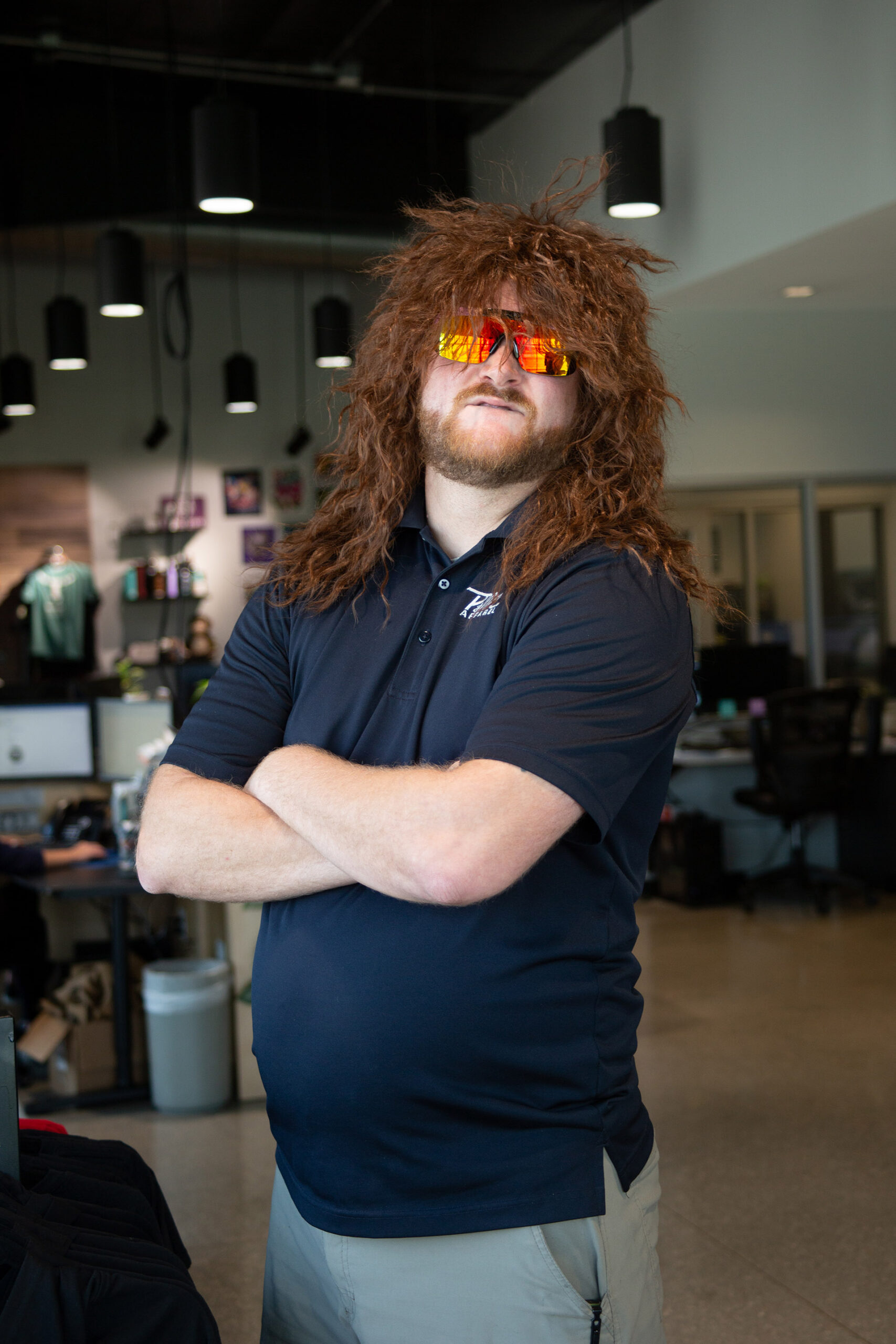 man wearing wig and sunglasses
