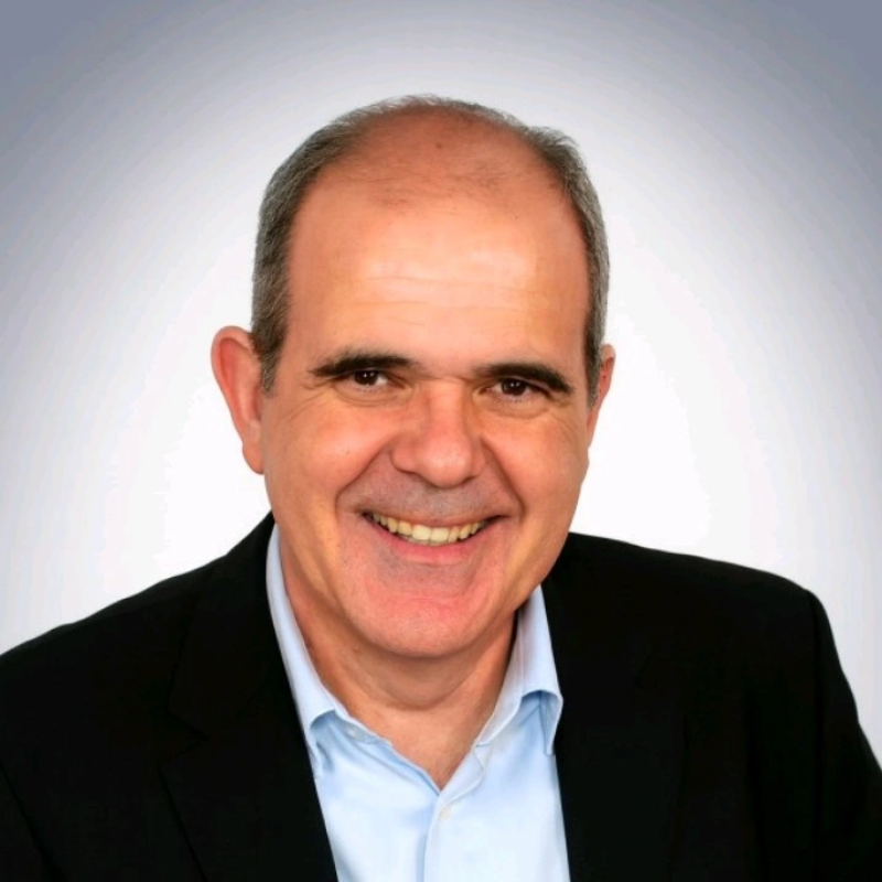 head shot of josep in black blazer