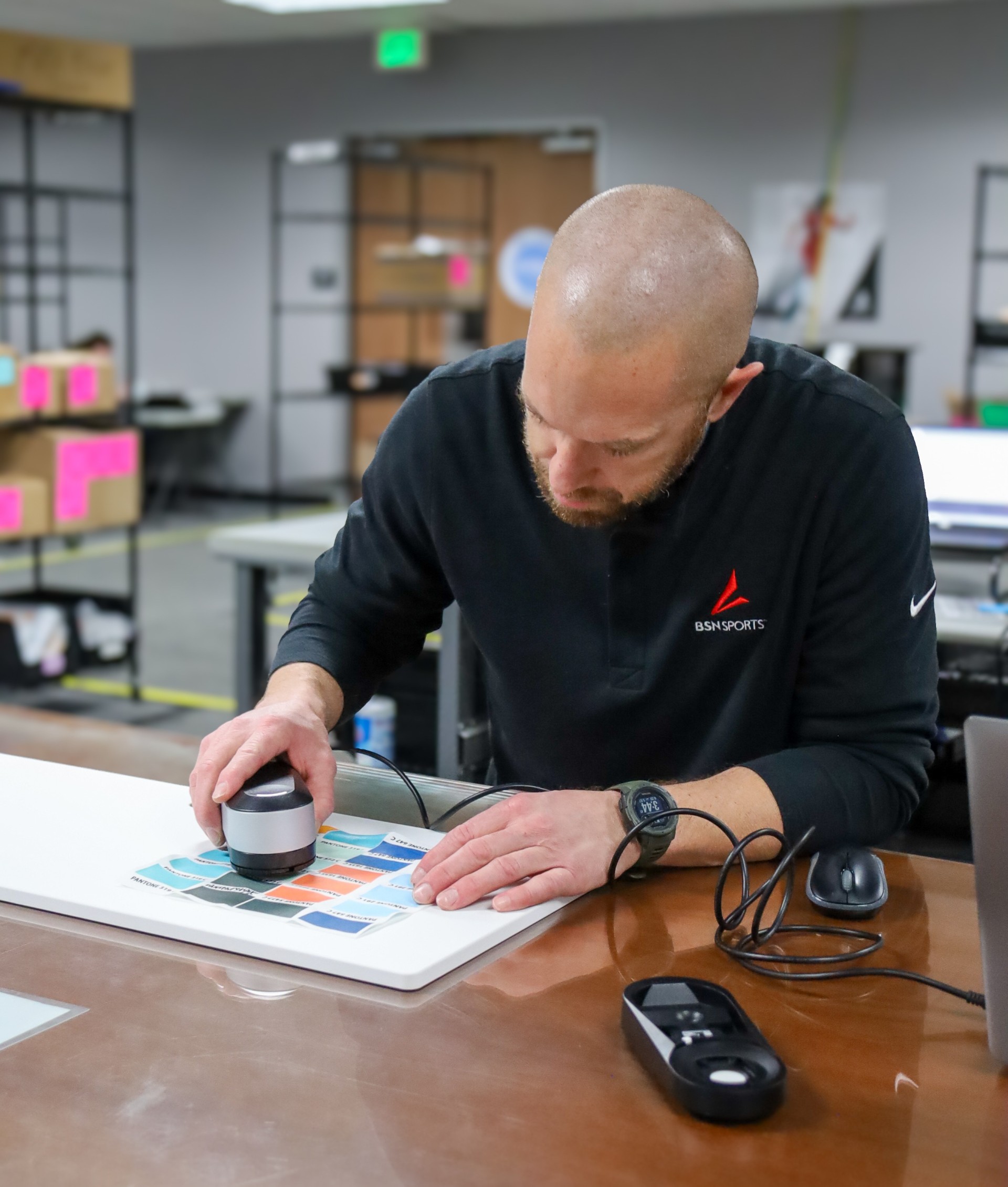 man holding spectrophotometer