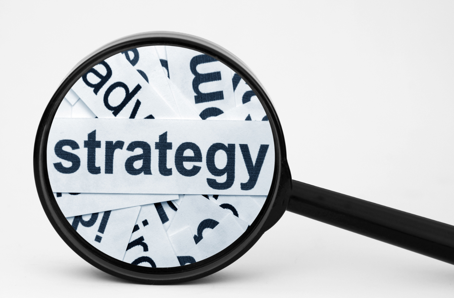 magnifying glass on word strategy