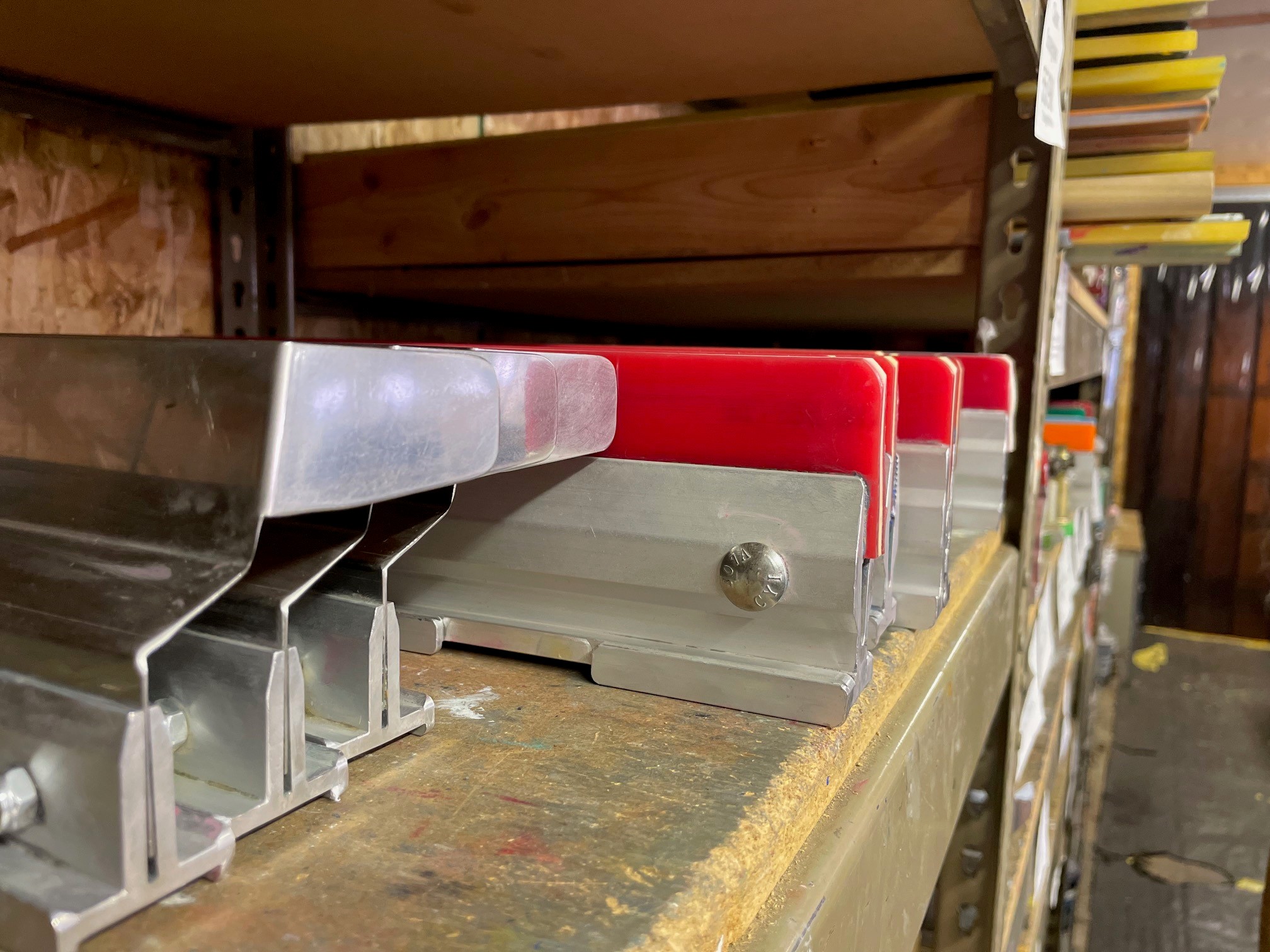 squeegees on a shelf
