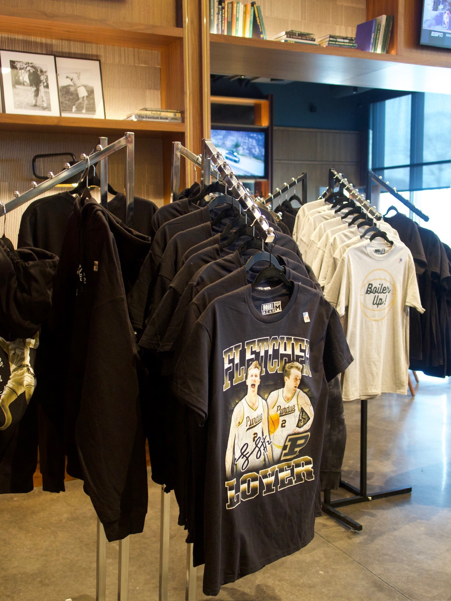 racks with black and white tshirts