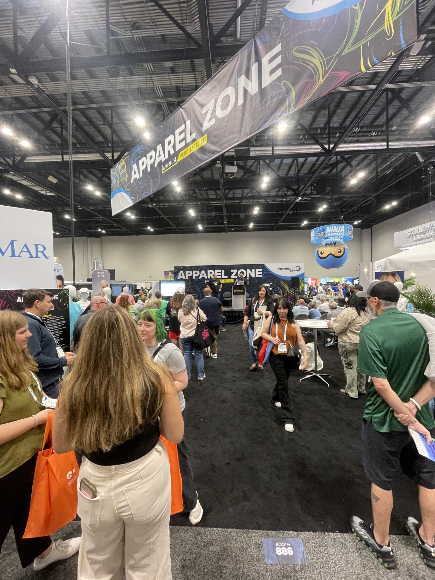 crowd at a stage presentation