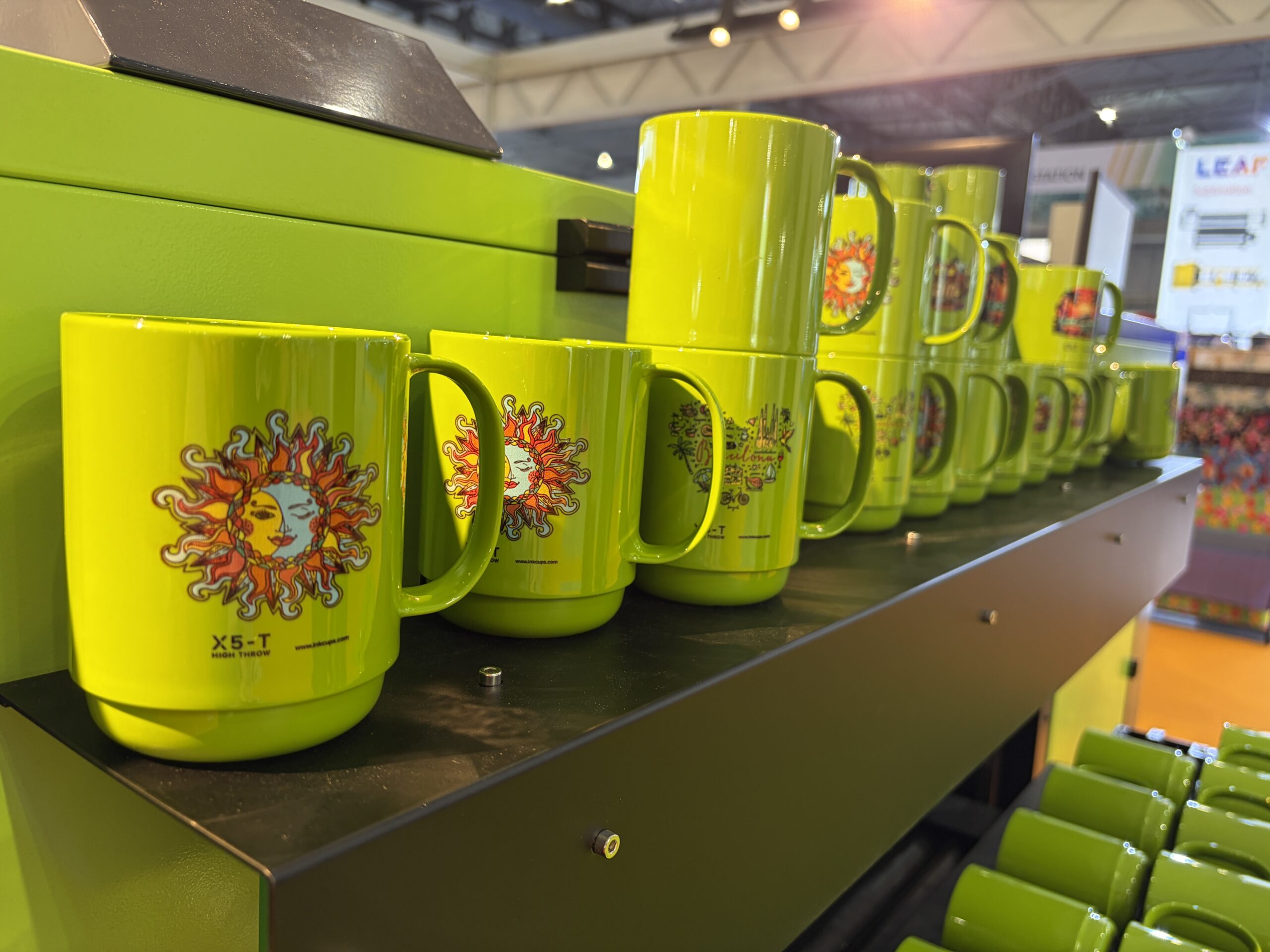 green printed mugs