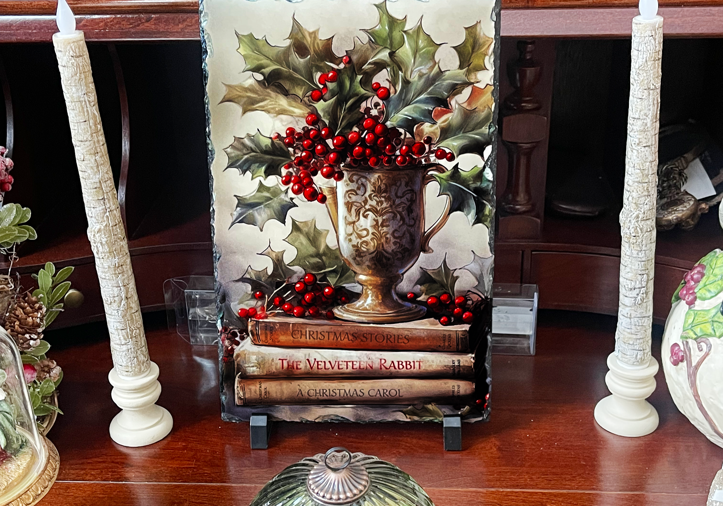 printed slate on a shelf with candles